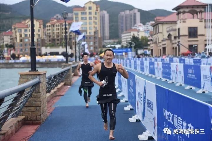 雨中竞技！最难最虐威海超级铁三 法国选手独揽10万大奖