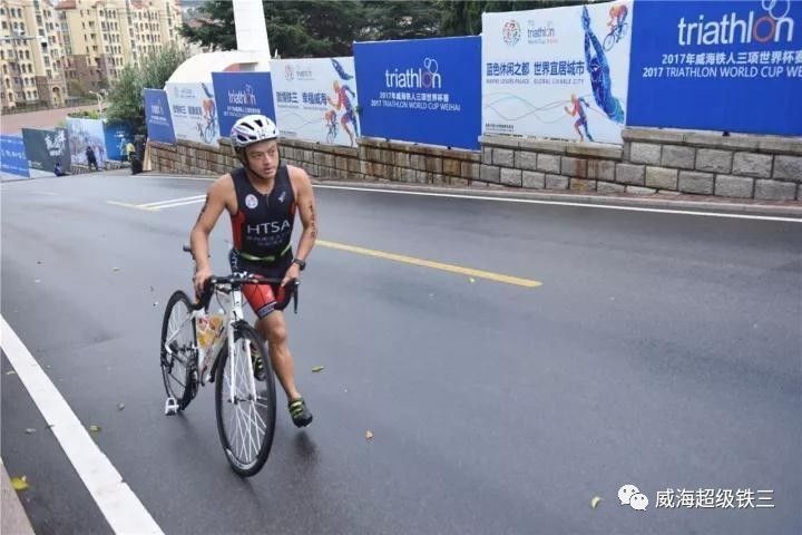 雨中竞技！最难最虐威海超级铁三 法国选手独揽10万大奖