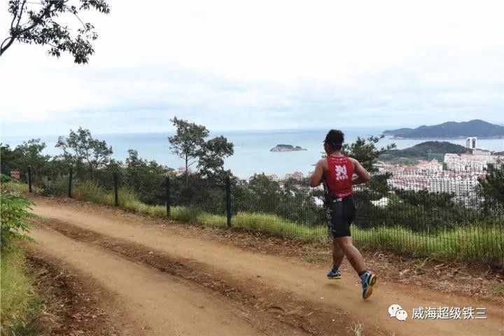 雨中竞技！最难最虐威海超级铁三 法国选手独揽10万大奖