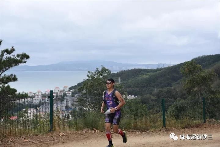 雨中竞技！最难最虐威海超级铁三 法国选手独揽10万大奖